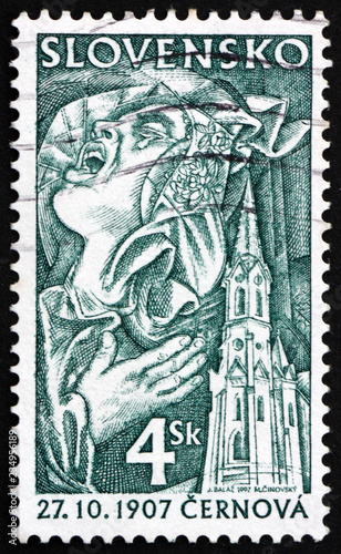 Postage stamp Slovakia 1997 lamenting woman and church © laufer