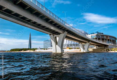 View from the water under the Yacht bridge on the skyscraper Lakhta in St. Petersburg photo