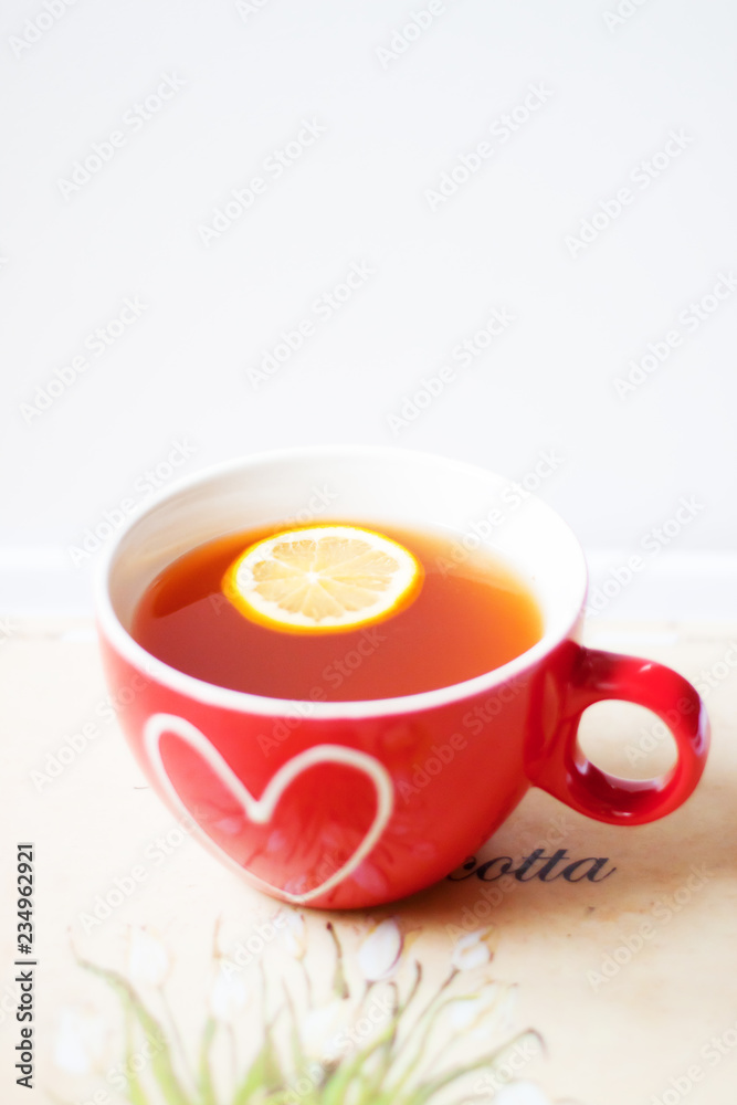 Having a cup of tea in bed - cozy breakfest at home Having a cup of tea in bed - cozy breakfest at home