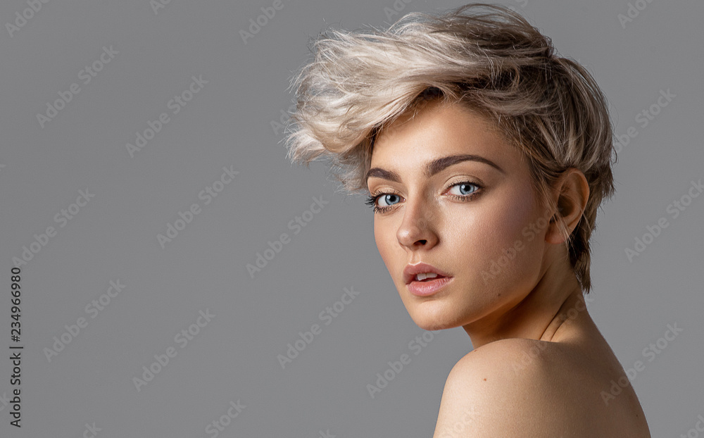 Beauty portrait of fashion young model with short hair