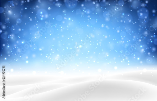 Blue shiny background with winter landscape and snow for seasonal, Christmas and New Year design.