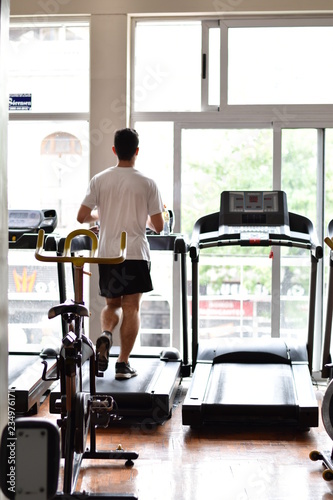men running at gym 