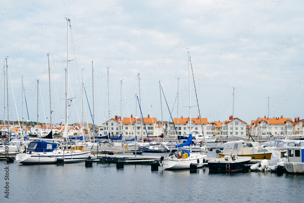 Pier with parked yachts in the marine town on the Southern cost of Sweden.