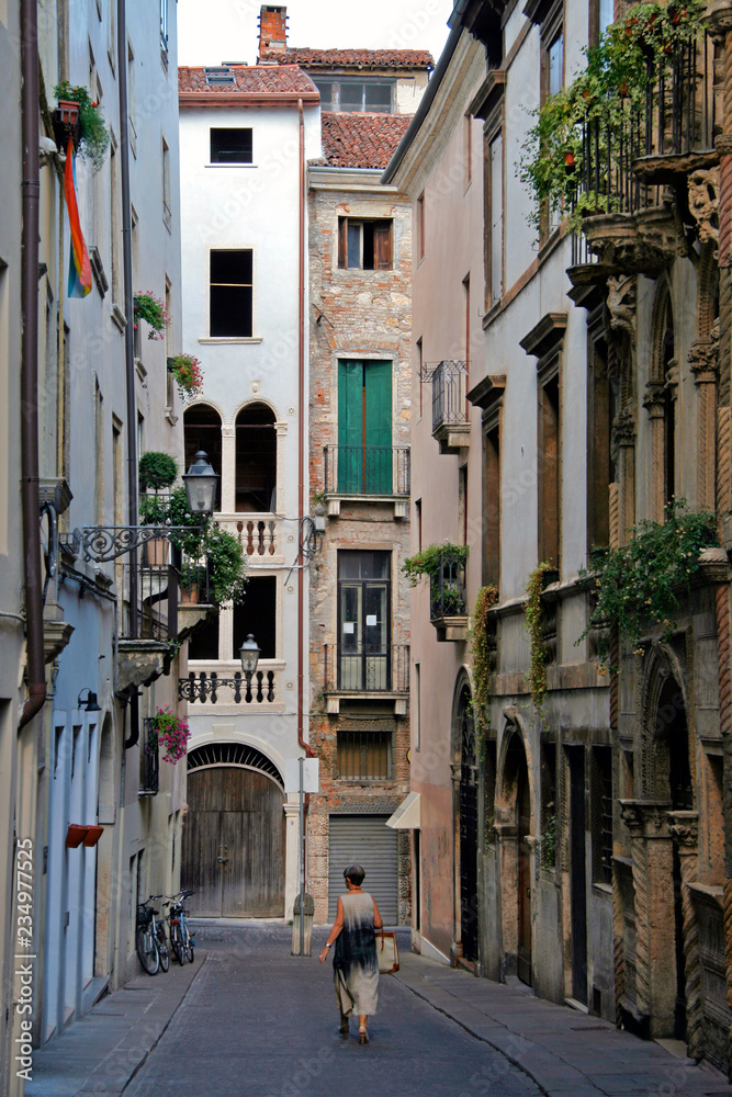 Vicenza, Veneto / Italy - August 2008: Narrow street in the old city centre