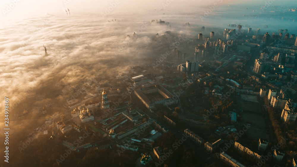Aerial view of the city in dense fog