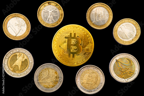 Bitcoin with money coins background. Bitcoin cryptocurrency banking moneyand Euro coins money isolated on black photo