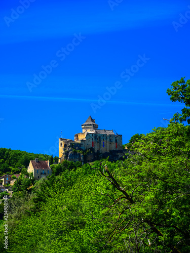 A view of the medieval fortress of Castelnaud La Chapelle high above the Dordogne River in Aquitaine, France © Euskera Photography