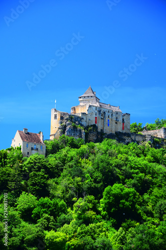 A view of the medieval fortress of Castelnaud La Chapelle high above the Dordogne River in Aquitaine, France