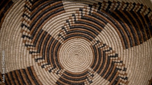 textura rustica de canasto en colores tierra geometria circular photo