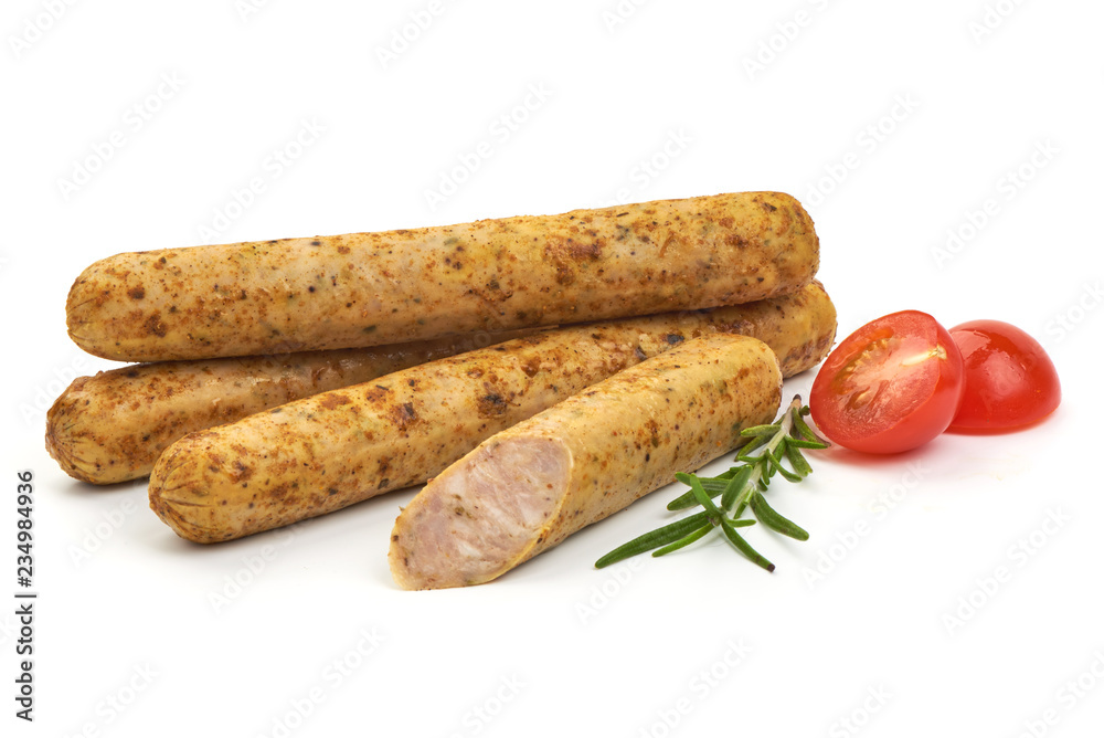 Delicious BBQ Sliced Sausages with herbs and tomatoes, isolated on a white background. Close-up. Delicious BBQ Sliced Sausages with herbs and tomatoes, isolated on a white background. Close-up.
