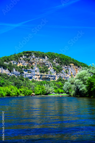 A view up the Dordogne River near the medieval village of La Roque Gageac in Aquitaine  France