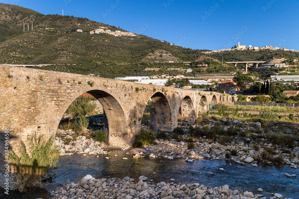Fototapeta premium Medieval bridge in Taggia, Italy.