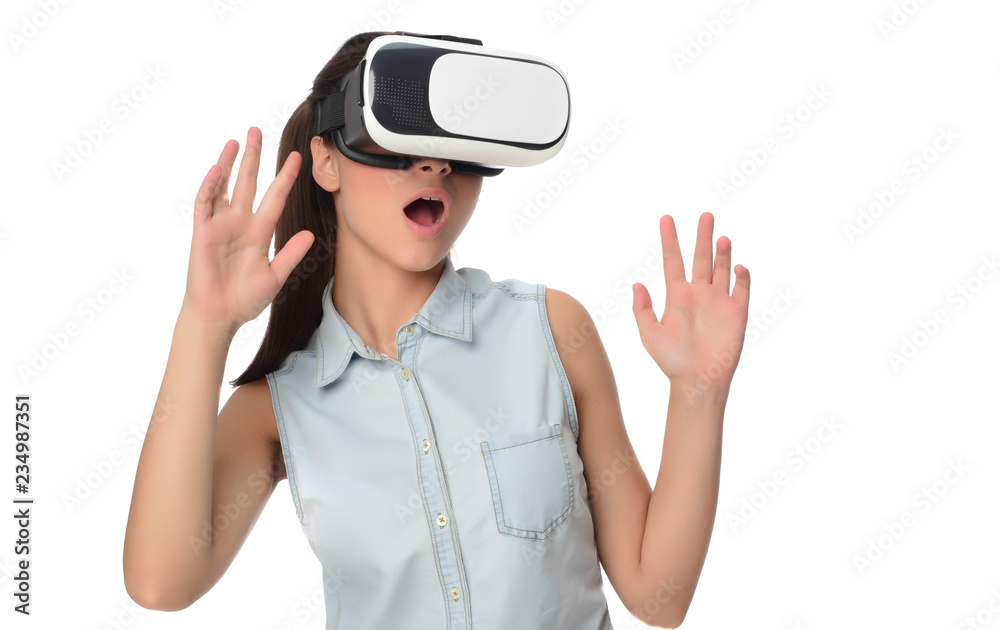 Young woman in virtual reality (VR) glasses holding tablet. Isolated on white background