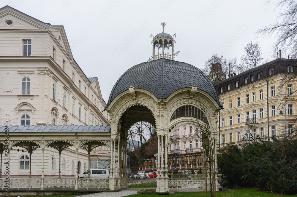 Naklejka premium Karlovy Vary is a spa town in the Czech Republic. On the territory of the city there are 12 healing springs, with a carbon dioxide content and a water temperature of 30 to 72 degrees Celsius. 