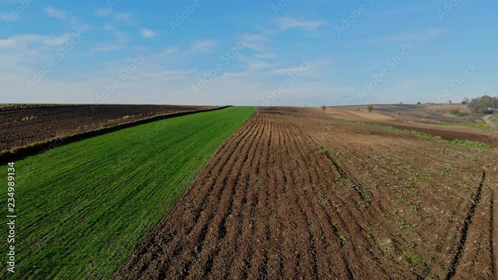 A flight over cultivated fields in the light of the autumn sun. A flight over cultivated fields in the light of the autumn sun.