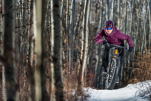 Woman Riding a Fat Bike in the Snow