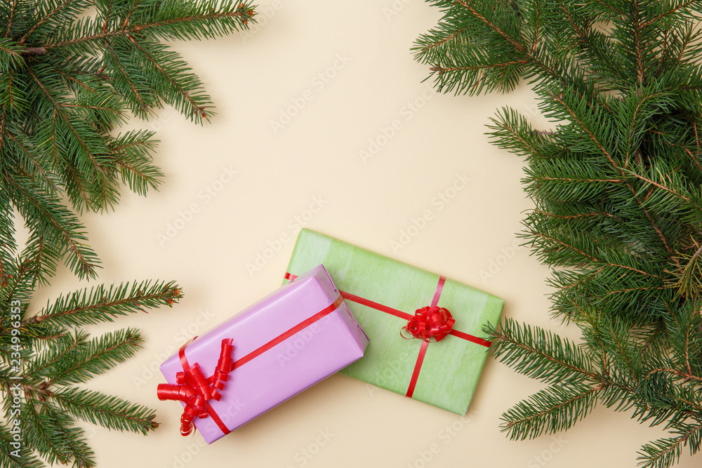 Christmas tree and gifts on wooned background. Christmas tree and gifts on wooned background.