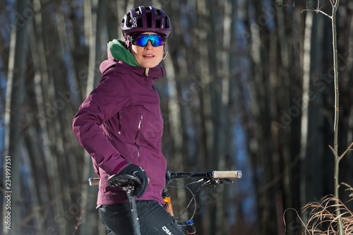 Woman Riding a Fat Bike in the Snow