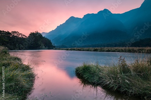 Evening atmosphere in Eglinton river, Eglinton valley, Milford Highway, Fiordland National Park, Southland, New Zealand, Oceania photo