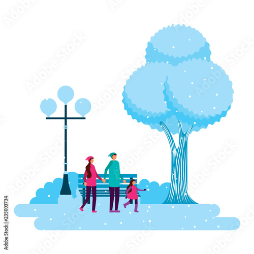 family in the park winter scenery