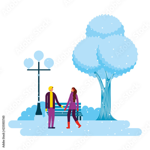 couple in the park winter scenery