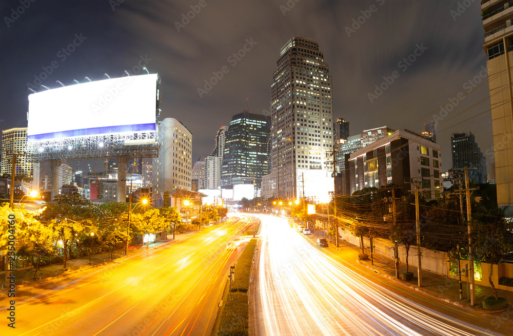 Motion light traffic on road With billboard and Cityscape