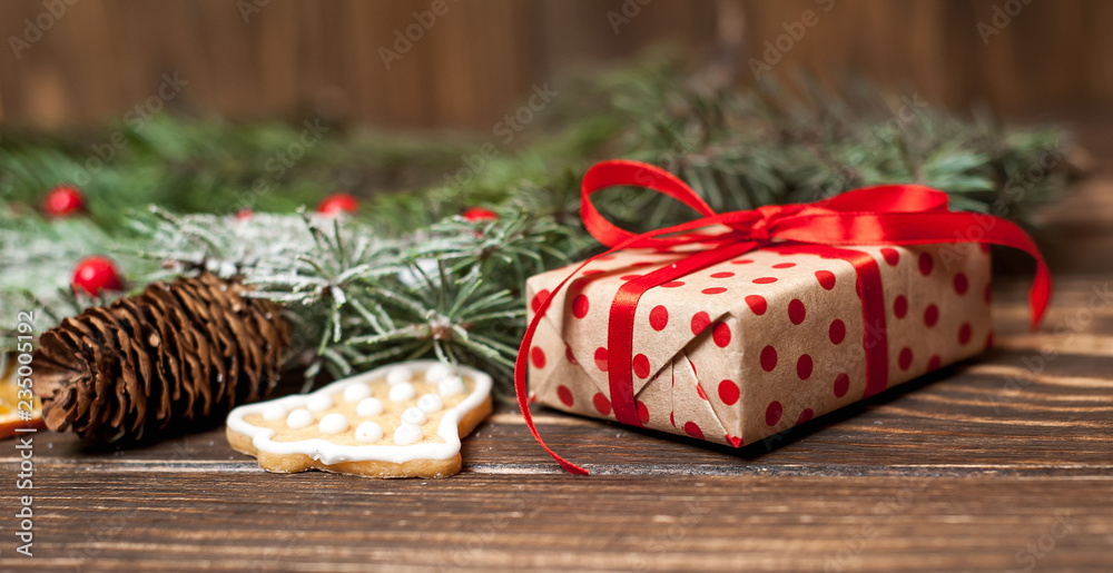 Christmas fir tree with decoration on a wooden board. Copy-space for text Christmas fir tree with decoration on a wooden board. Copy-space for text