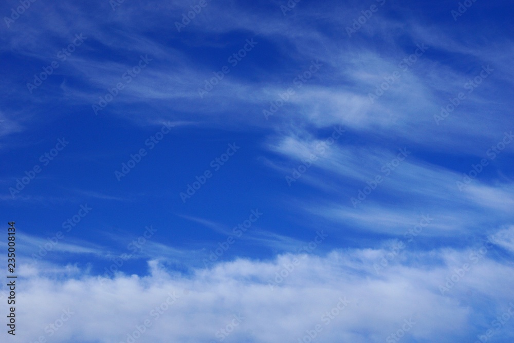 many white small clouds on blue sky