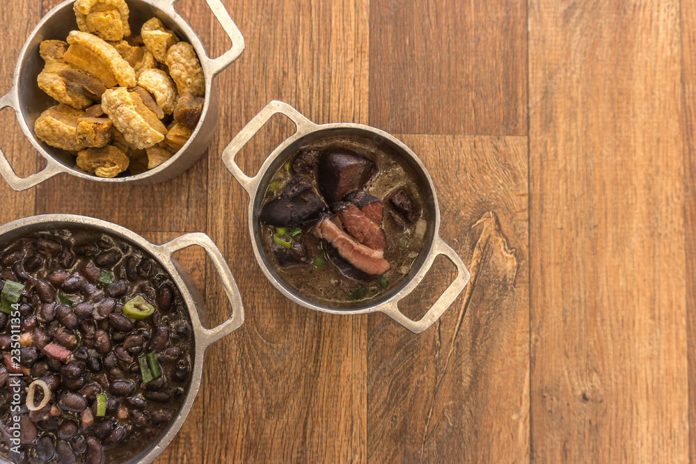 Dishes that are part of the traditional feijoada, typical Brazilian food Dishes that are part of the traditional feijoada, typical Brazilian food
