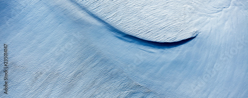 Aerial image showing the moving ice of the ice cap of the Jostedalsbreen glacier shaped by the powers of nature, Norway
