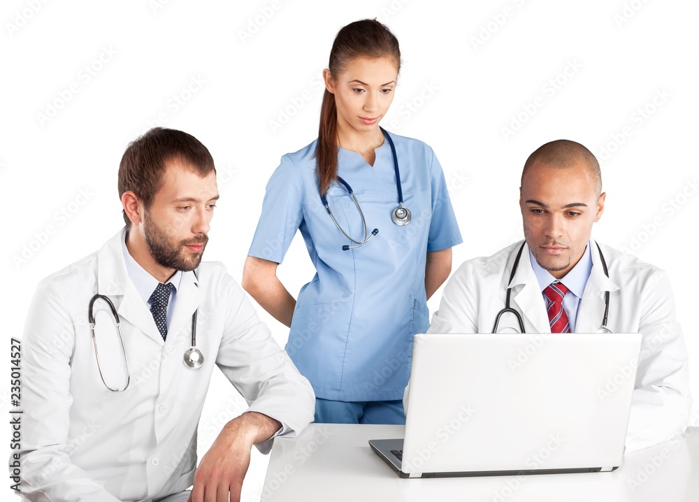 Portrait of Doctors Looking at Laptop Portrait of Doctors Looking at Laptop