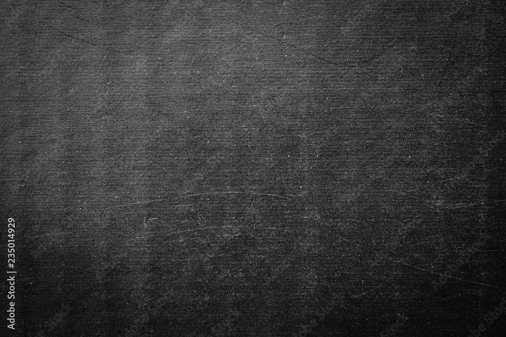 black paper texture or background with spotlight, dark wall backdrop wallpaper, dark tone.