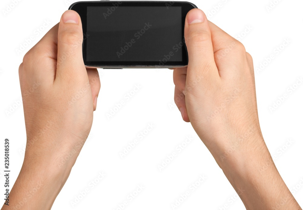 Person holding a phone horizontally with a blank screen Person holding a phone horizontally with a blank screen