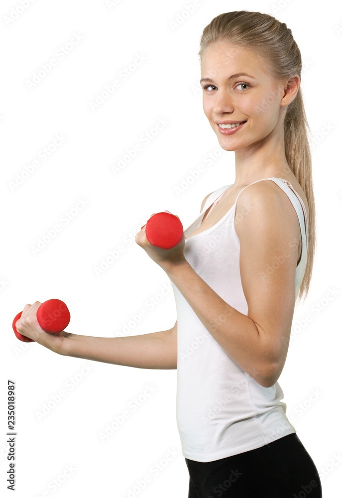 Close-up attractive young woman holding dumbbells on white Close-up attractive young woman holding dumbbells on white