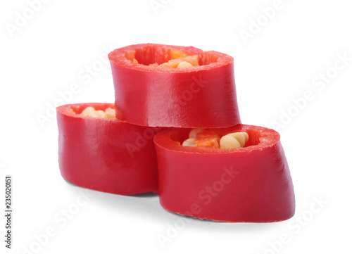 Slices of red chili pepper on white background
