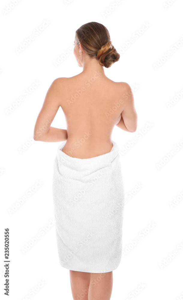 Young woman with soft towel on white background Young woman with soft towel on white background