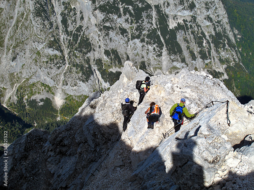 Mountaineers climbing Mount Alpspitze south ridge route in Bavaria, Germany. Alpspitze is the second highest mountain in Germany.