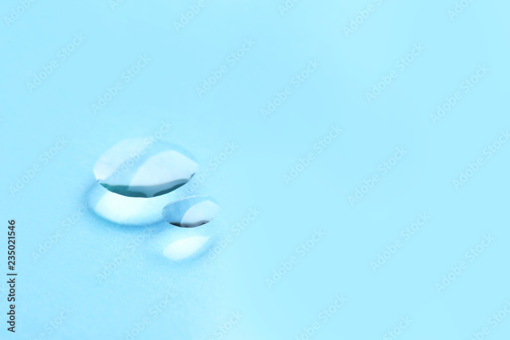 Pure water drops on color background, closeup. Space for text - obrazy, fototapety, plakaty 