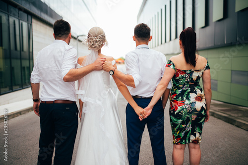 bride, groom, maid of honor and best man photo