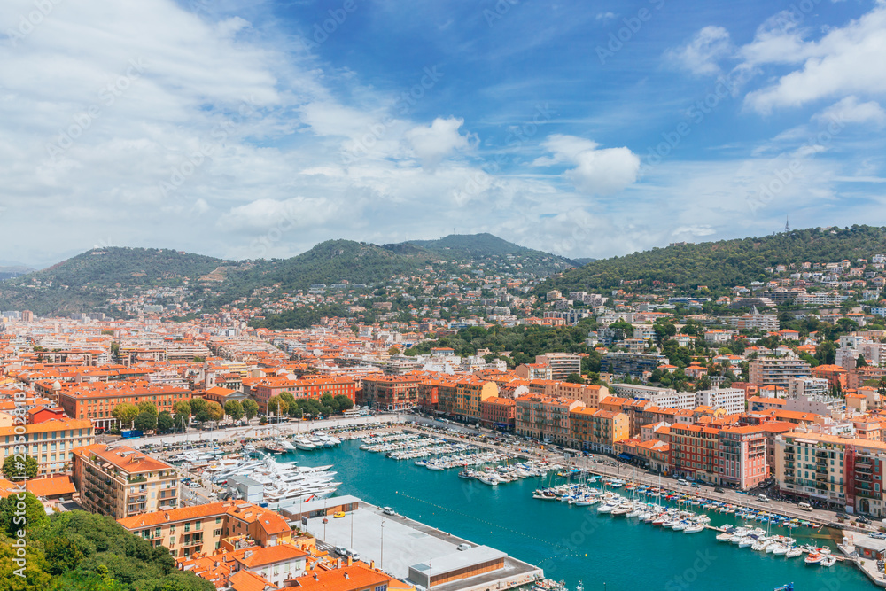 View of the port of Nice, France, with boats and houses