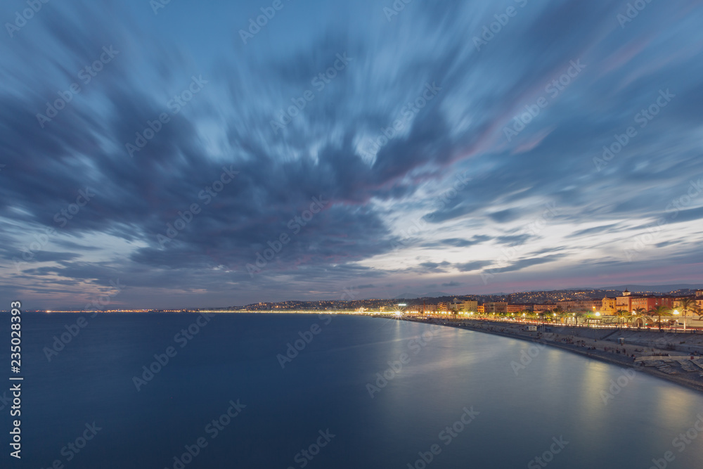 Φωτογραφία City of Nice, France next to sea after sunset in early evening