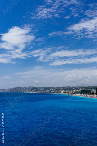 Buildings and beaches next to blue sea in the city of Nice, France © Mark Zhu