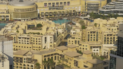 Static clip of the Souk al Bahar and Dubai Mall, during a sunny day, as seen from a high position. photo