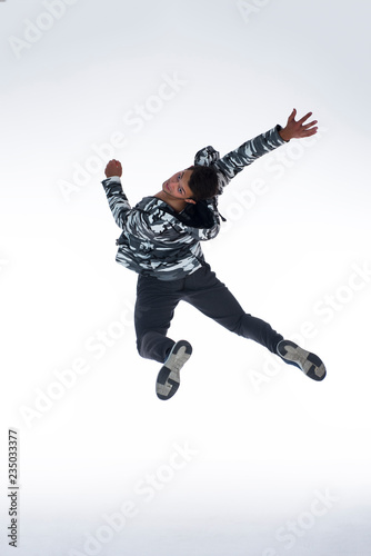 Cool young break dancer isolated on white background