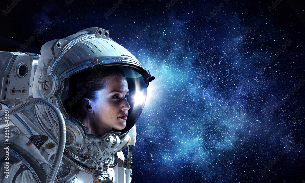 Attractive woman in spacesuit Attractive woman in spacesuit