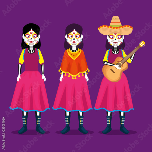 catrina with hat and guitar to celebrate day of the dead