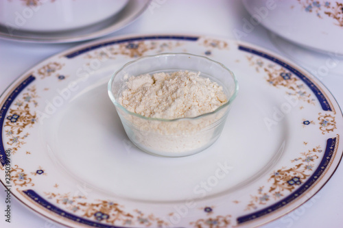 Some flour in a glass container