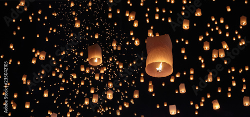 Tourist floating sky lanterns in Loy Krathong festival , Chiang Mai ,Thailand.