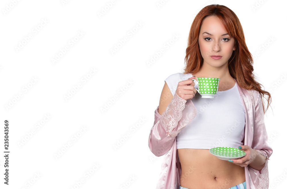 beautiful red headed women drinking coffee-tea and holding cup isolated on white beautiful red headed women drinking coffee-tea and holding cup isolated on white
