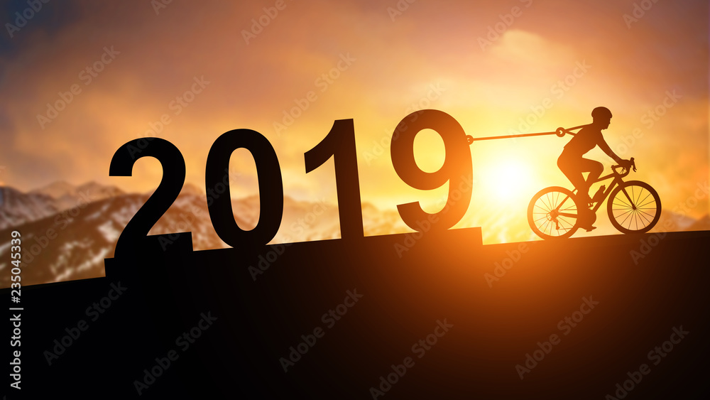 silhouette bicycle pull 2019 Text to sunset mountain background in Happy New  Year Concept Stock Photo | Adobe Stock